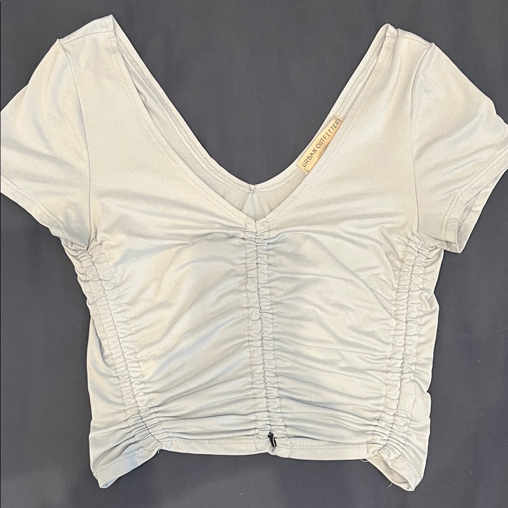 URBAN OUTFITTERS light blue cropped, ruched, v neck short-sleeve t-shirt. Size S